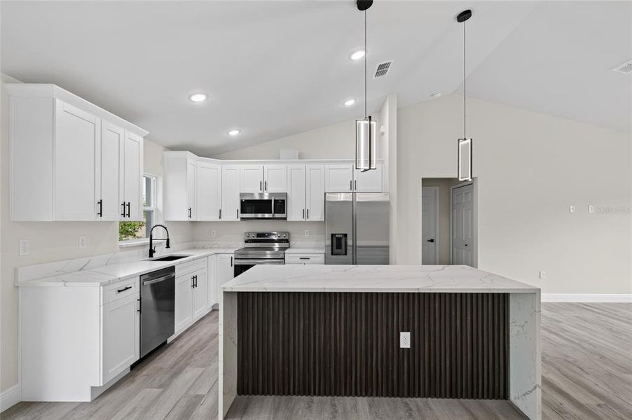 Furnished interior view inside a new home in , Dunnellon (Image 14).