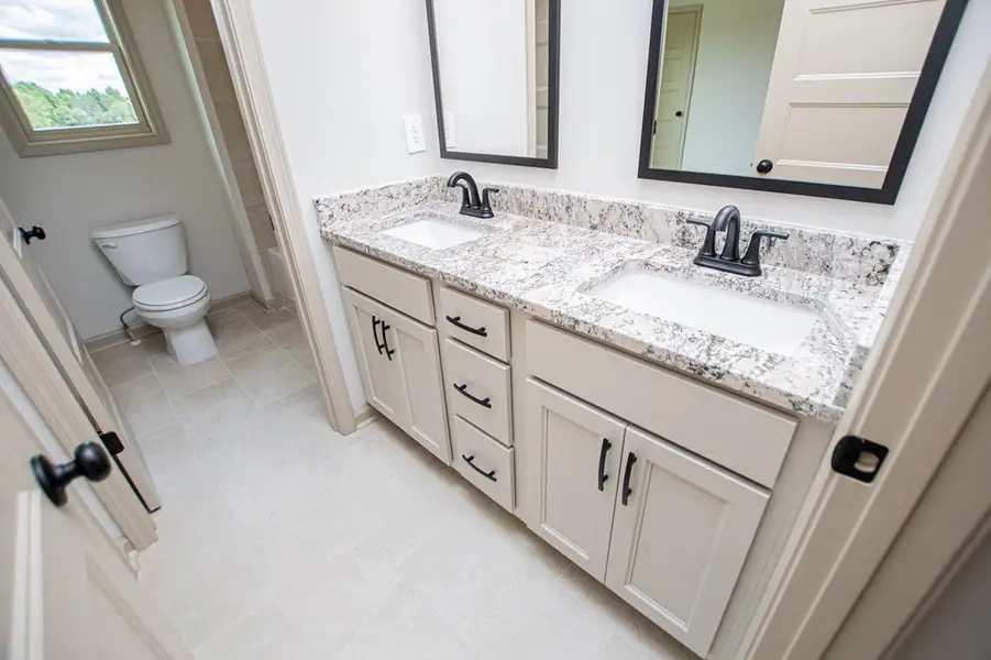 Furnished interior view inside a new home in WOODMONT RESERVE, Roopville (Image 18).