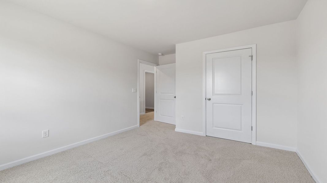 Spacious, unfurnished interior of a new home in Durbin Meadows Traditions, Fountain Inn (Image 22).