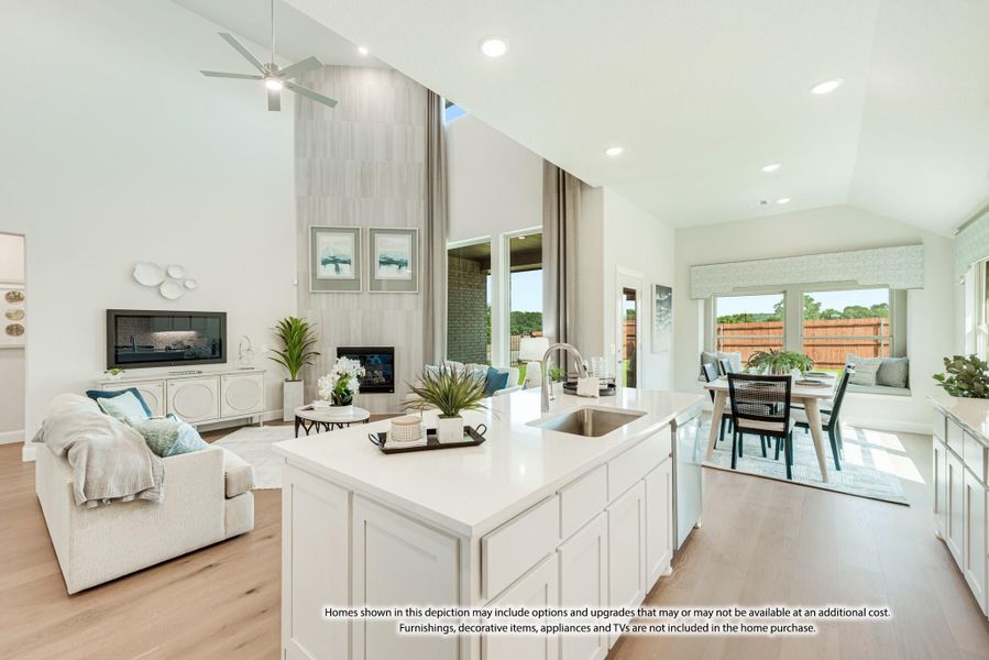 Open-concept living area with kitchen island, vaulted ceiling, fireplace, and dining space on hardwood floors Open-concept living area with kitchen island, vaulted ceiling, fireplace, and dining space on hardwood floors