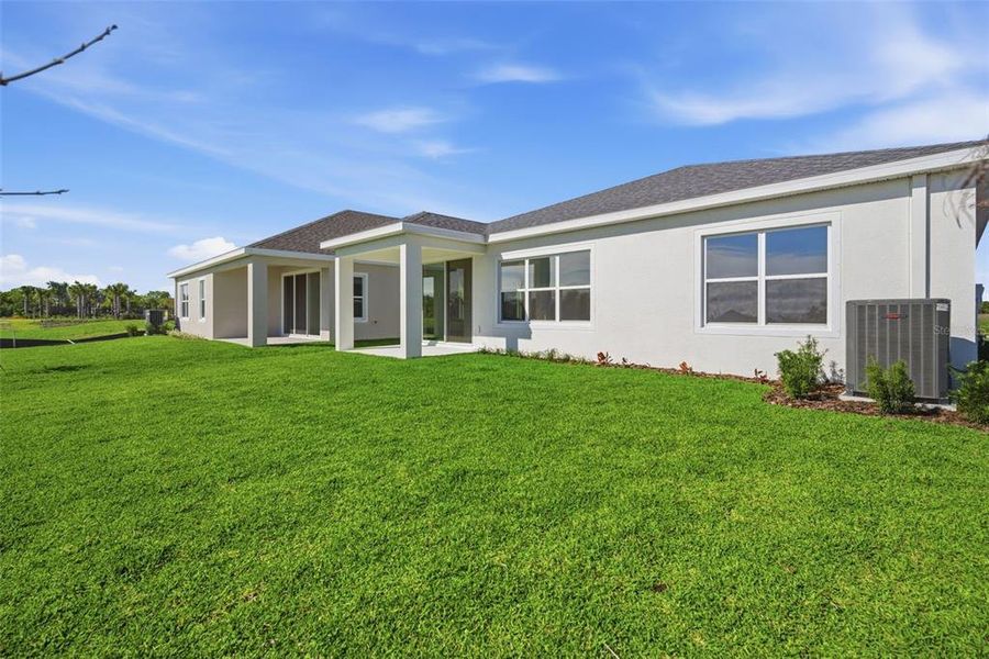 Exterior details and patio area of a home in Coasterra, Palmetto (Image 4).