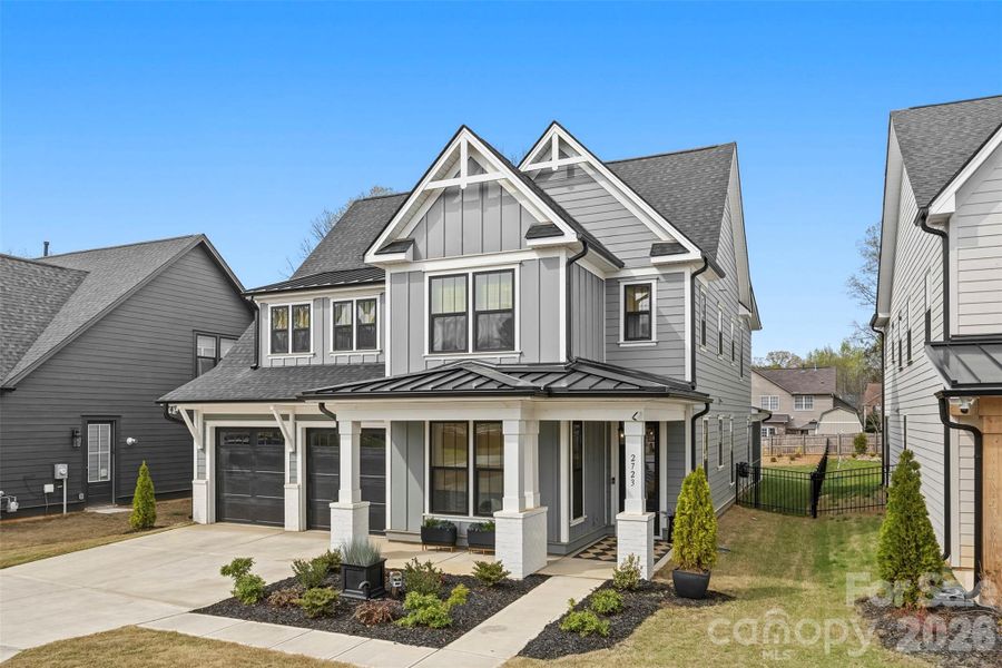 Front exterior of a new home in Matthews Ridge Reserve, Matthews, NC, highlighting curb appeal (Image 22). Front exterior of a new home in Matthews Ridge Reserve, Matthews, NC, highlighting curb appeal (Image 22).