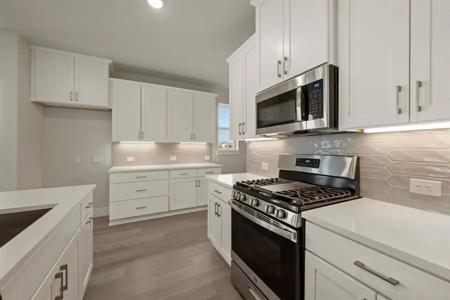 Beautiful cabinetry and finishes in a neutral color palette are waiting for you in this dream home!