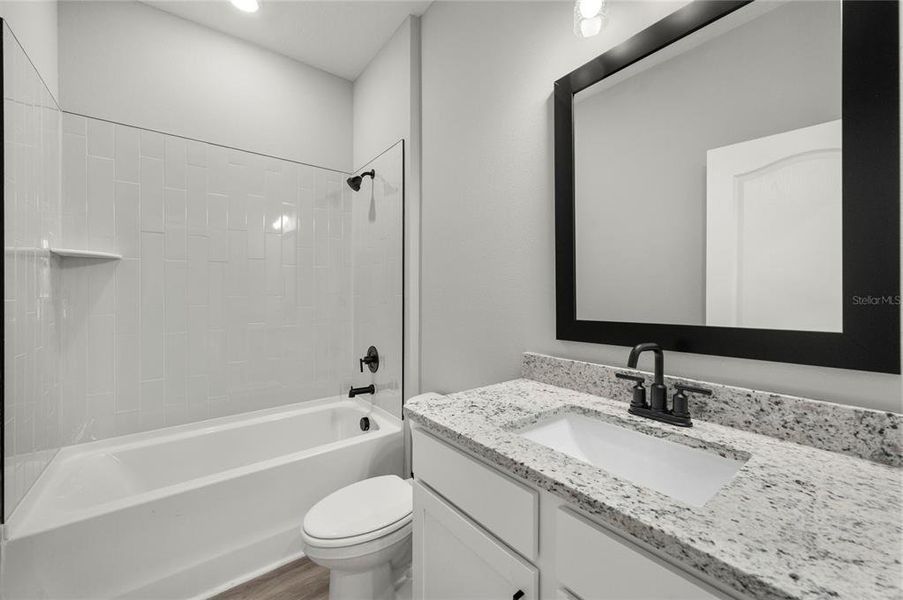 Furnished interior view inside a new home in , Kissimmee (Image 2). Furnished interior view inside a new home in , Kissimmee (Image 2).