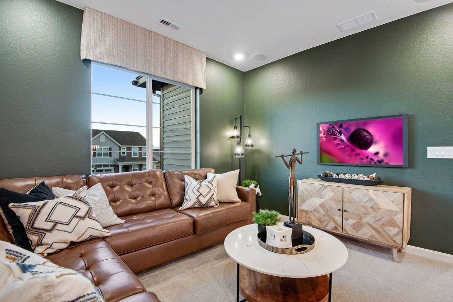 Furnished interior view inside a new home in Reunion, Commerce City (Image 13).