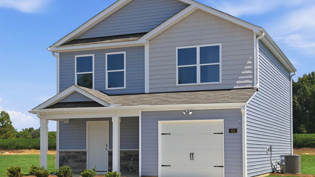Front exterior of a new home in Hobbs Farm, Ayden, NC, highlighting curb appeal (Image 20).