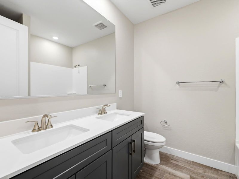 Furnished interior view inside a new home in Legacy Place, Glendale (Image 12).