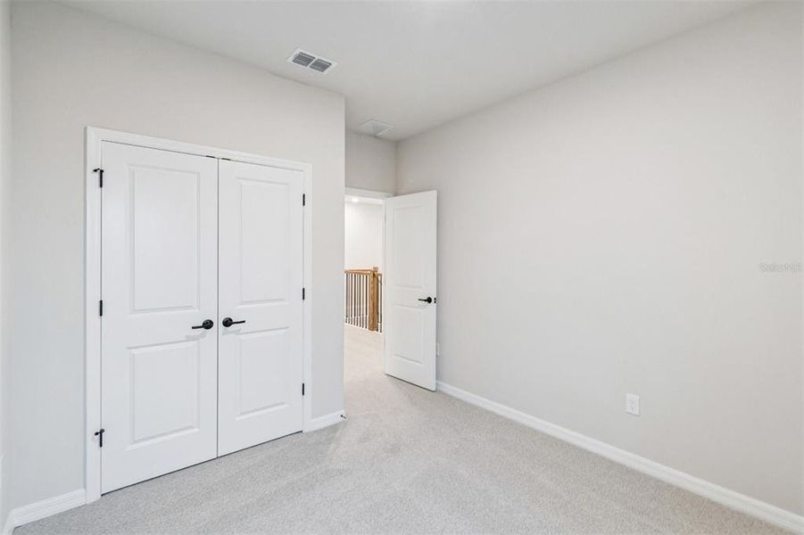 Spacious, unfurnished interior of a new home in Weslyn Park in Sunbridge 34', St. Cloud (Image 21). Spacious, unfurnished interior of a new home in Weslyn Park in Sunbridge 34', St. Cloud (Image 21).