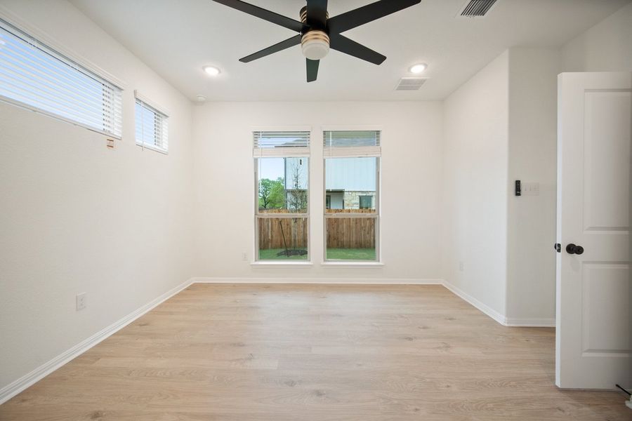 Spacious, unfurnished interior of a new home in The Hills of Bear Creek, Manchaca (Image 17).