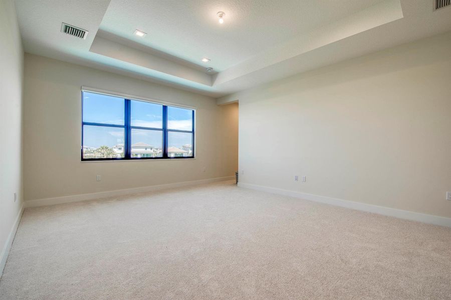 Furnished interior view inside a new home in Apex at Avenir, Palm Beach Gardens (Image 29).