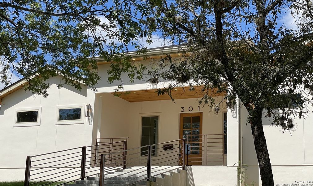 Front exterior of a new home in , Terrell Hills, TX, highlighting curb appeal (Image 25). Front exterior of a new home in , Terrell Hills, TX, highlighting curb appeal (Image 25).