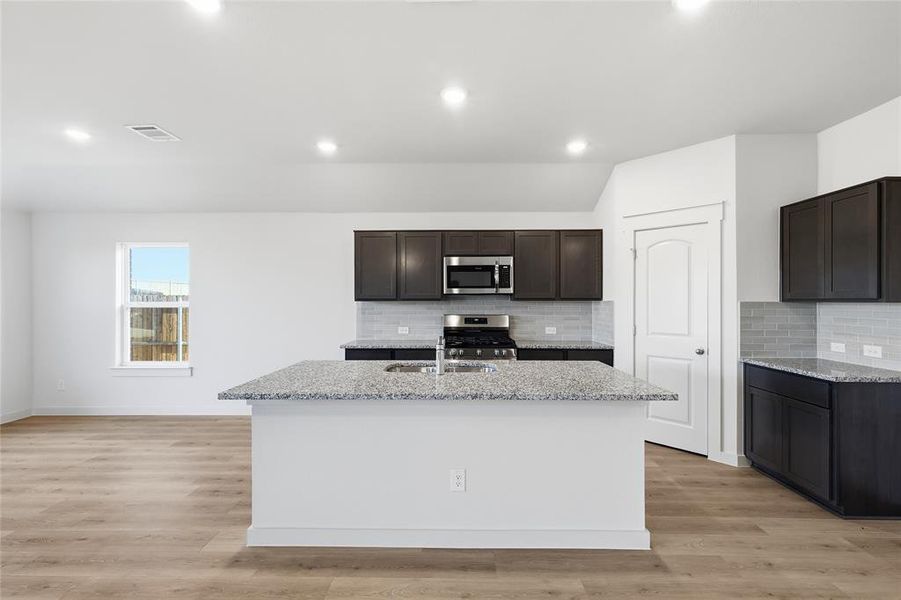 Furnished interior view inside a new home in Patriot Estates, Venus (Image 10).