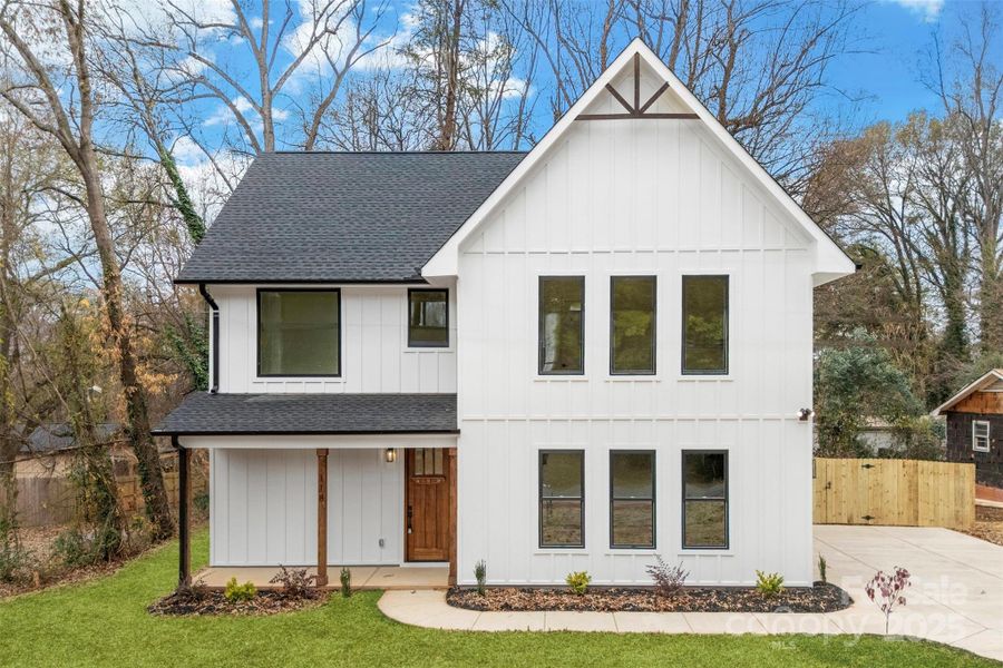 Front exterior of a new home in , Belmont, NC, highlighting curb appeal (Image 1).