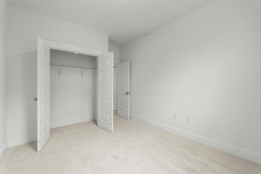 Spacious, unfurnished interior of a new home in Long Bay Golf Club, Longs (Image 37).
