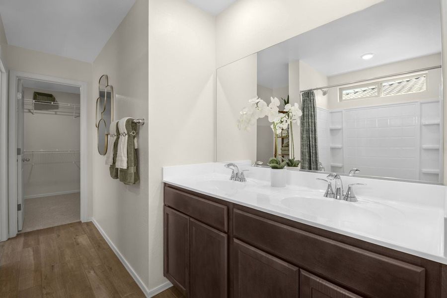 Dual-sink vanity at primary bath