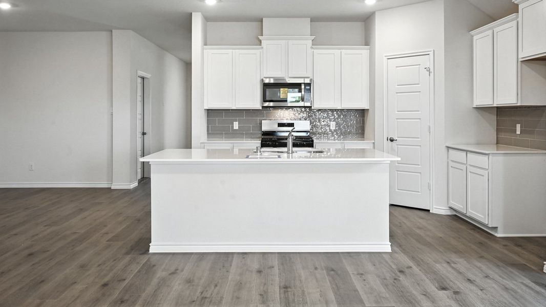 Furnished interior view inside a new home in Fireside by the Lake, Garland (Image 7).