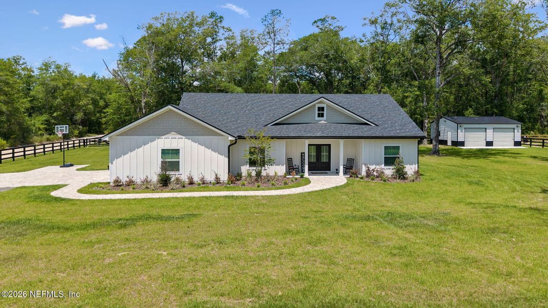 Front exterior of a new home in , Macclenny, FL, highlighting curb appeal (Image 22). Front exterior of a new home in , Macclenny, FL, highlighting curb appeal (Image 22).