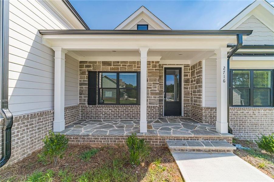 Exterior details and patio area of a home in , Loganville (Image 30).