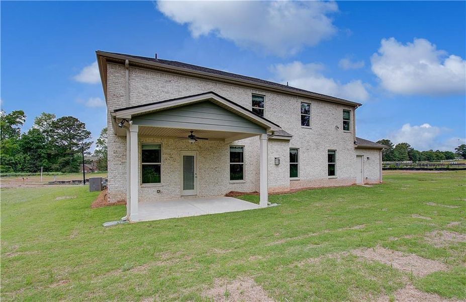 Exterior details and patio area of a home in Cambria at Traditions, Hampton (Image 4).