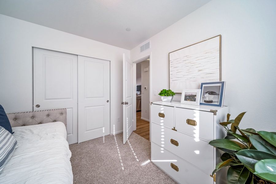 Furnished interior view inside a new home in Reunion, Commerce City (Image 24).