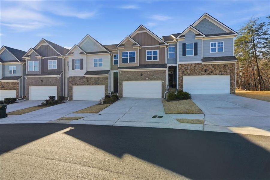 Front exterior of a new home in , Dahlonega, GA, highlighting curb appeal (Image 2). Front exterior of a new home in , Dahlonega, GA, highlighting curb appeal (Image 2).