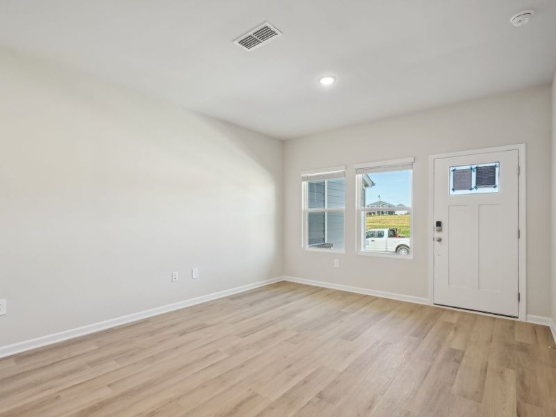 An open-concept great room is perfect for spending cozy nights in.