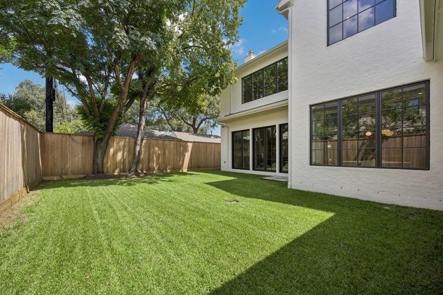 Exterior details and patio area of a home in , Houston (Image 4). Exterior details and patio area of a home in , Houston (Image 4).