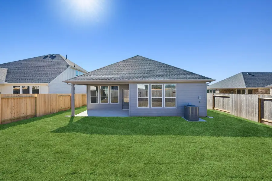 Exterior details and patio area of a home in Montgomery Bend, Montgomery (Image 4).