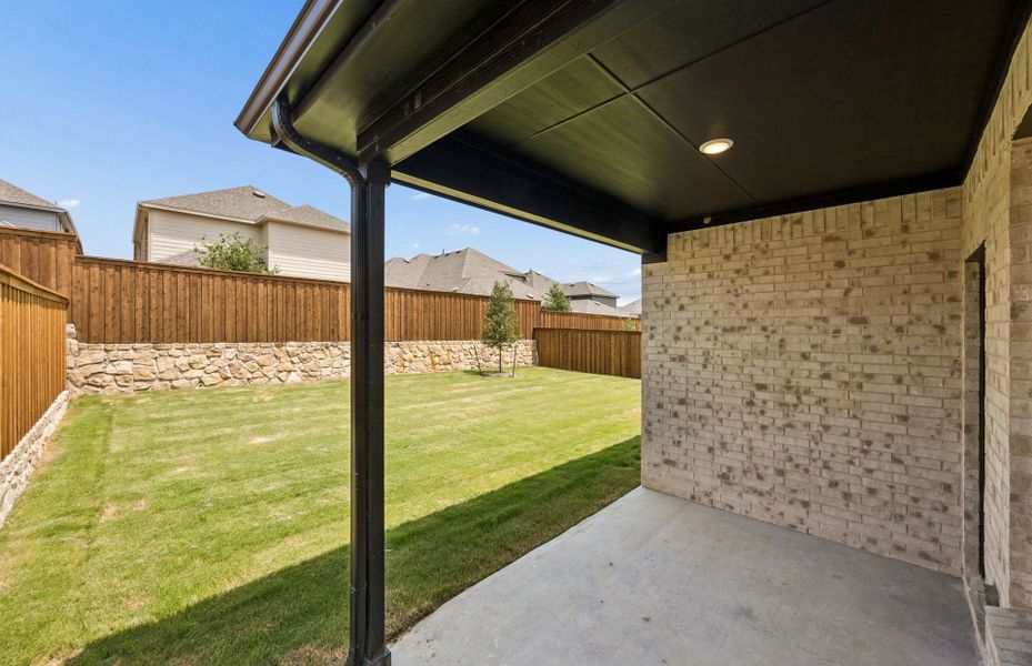 Exterior details and patio area of a home in Wilson Creek Meadows, Celina (Image 3). Exterior details and patio area of a home in Wilson Creek Meadows, Celina (Image 3).