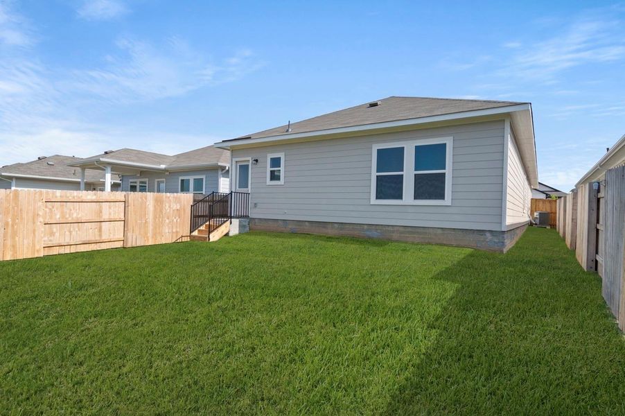 Exterior details and patio area of a home in Cloverleaf, Austin (Image 22).