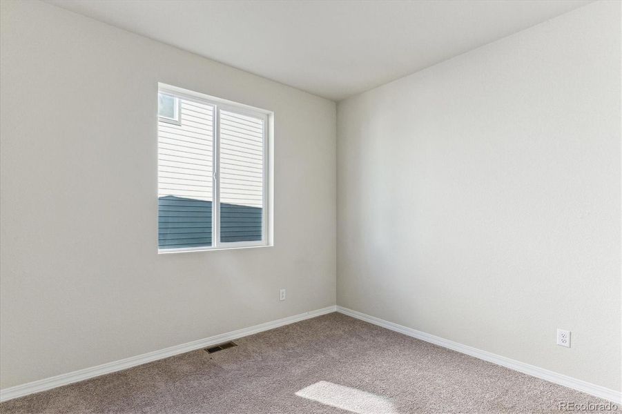 Spacious, unfurnished interior of a new home in Bradley Heights, Colorado Springs (Image 8).