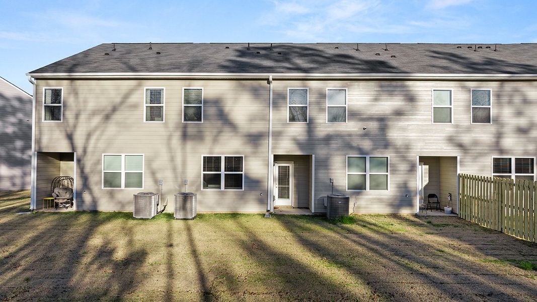 Exterior details and patio area of a home in Laurel Park Townhomes, Hephzibah (Image 3).