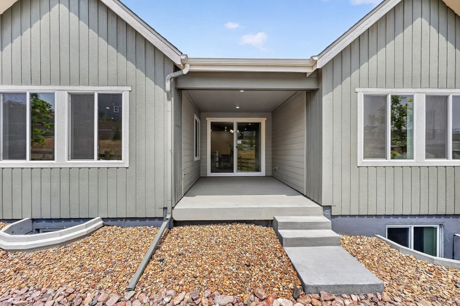 Exterior details and patio area of a home in Trailstone, Arvada (Image 24).
