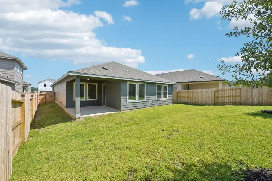 Exterior details and patio area of a home in Pine Lake Cove - Premier Series, Montgomery (Image 3).