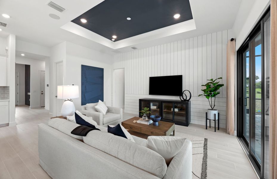 Representative furnished interior of a home built from the Prosperity by DiVosta in BeachWalk by Manasota Key, Englewood (Image 12).