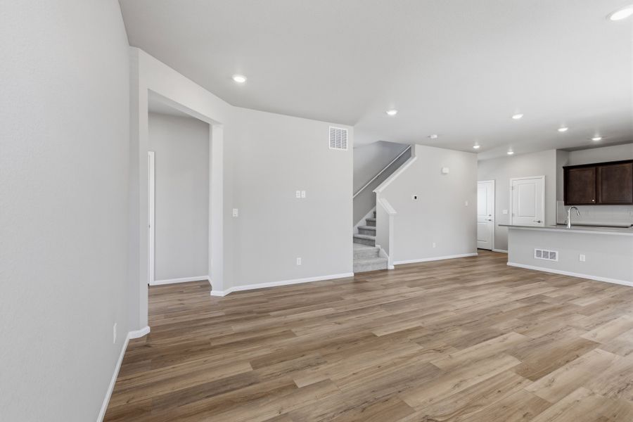 Spacious, unfurnished interior of a new home in Woodrose at Painted Prairie, Aurora (Image 10).