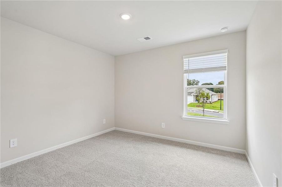 Spacious, unfurnished interior of a new home in Northwoods at Mirror Lake, Villa Rica (Image 47).