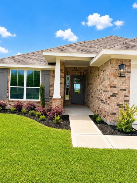 Attractive brick exterior with manicured landscaping, a covered front porch, and inviting curb appeal from every angle. Attractive brick exterior with manicured landscaping, a covered front porch, and inviting curb appeal from every angle.