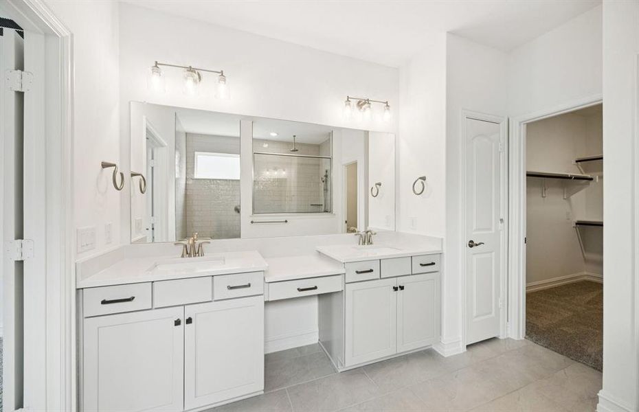 Double vanity in owner's bath Double vanity in owner's bath