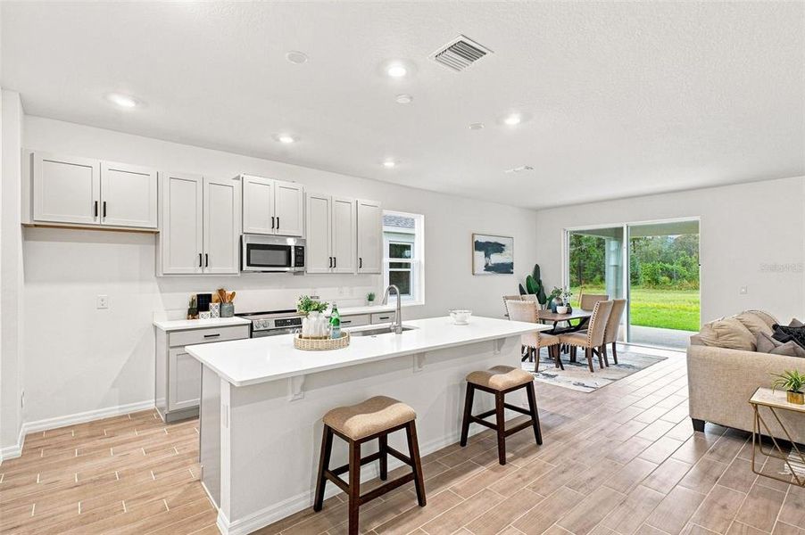 Furnished interior view inside a new home in Brack Ranch, St. Cloud (Image 11).