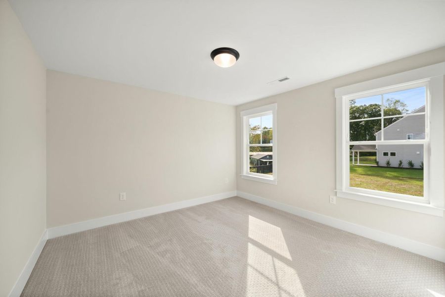 Spacious, unfurnished interior of a new home in Fiddler's Ridge, Advance (Image 35).