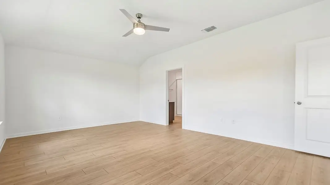 Spacious, unfurnished interior of a new home in Trails at Wildhorse, Austin (Image 37).