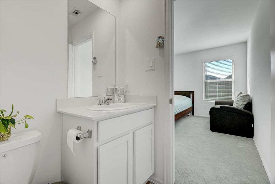Furnished interior view inside a new home in Pinewood at Grand Texas: Colonial & Cottage Collections, New Caney (Image 11).
