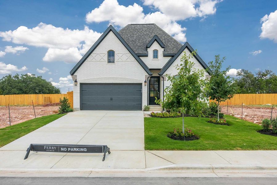 Front exterior of a new home in , Georgetown, TX, highlighting curb appeal (Image 12). Front exterior of a new home in , Georgetown, TX, highlighting curb appeal (Image 12).