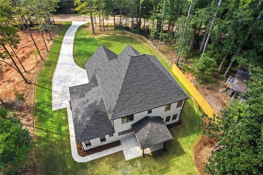 Front exterior of a new home in , Winder, GA, highlighting curb appeal (Image 28). Front exterior of a new home in , Winder, GA, highlighting curb appeal (Image 28).