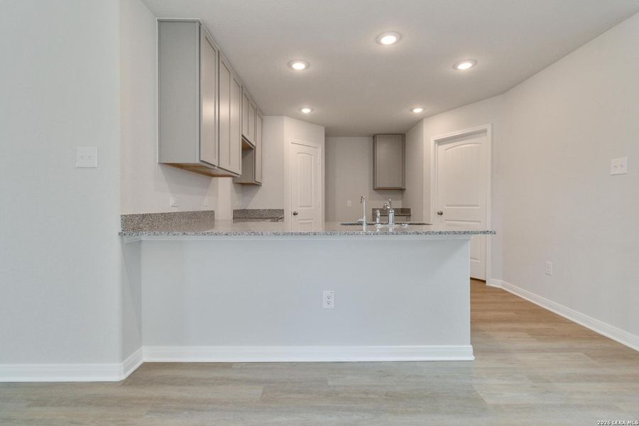 Furnished interior view inside a new home in Willow Point, San Antonio (Image 9).