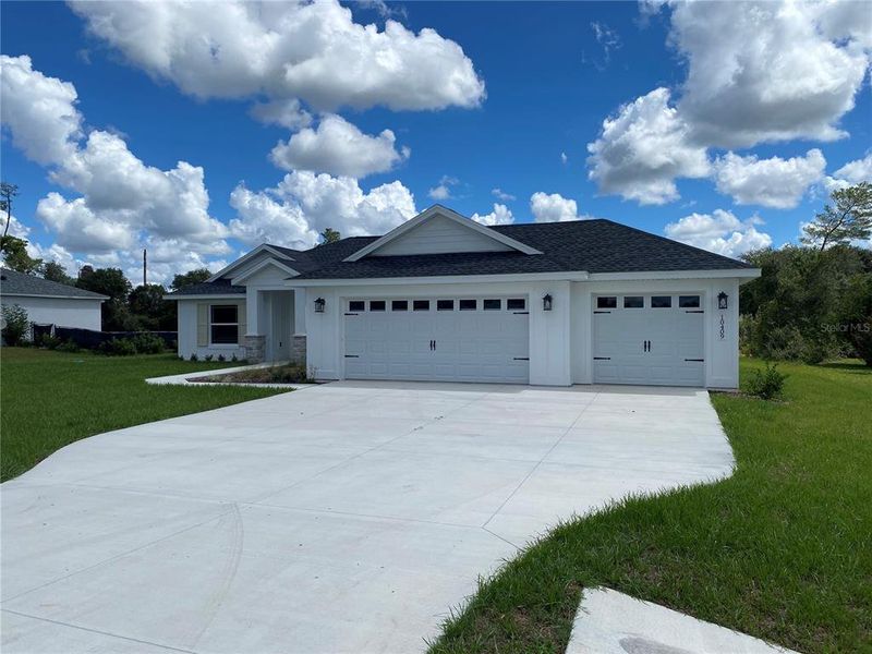 Front exterior of a new home in , Ocala, FL, highlighting curb appeal (Image 30).