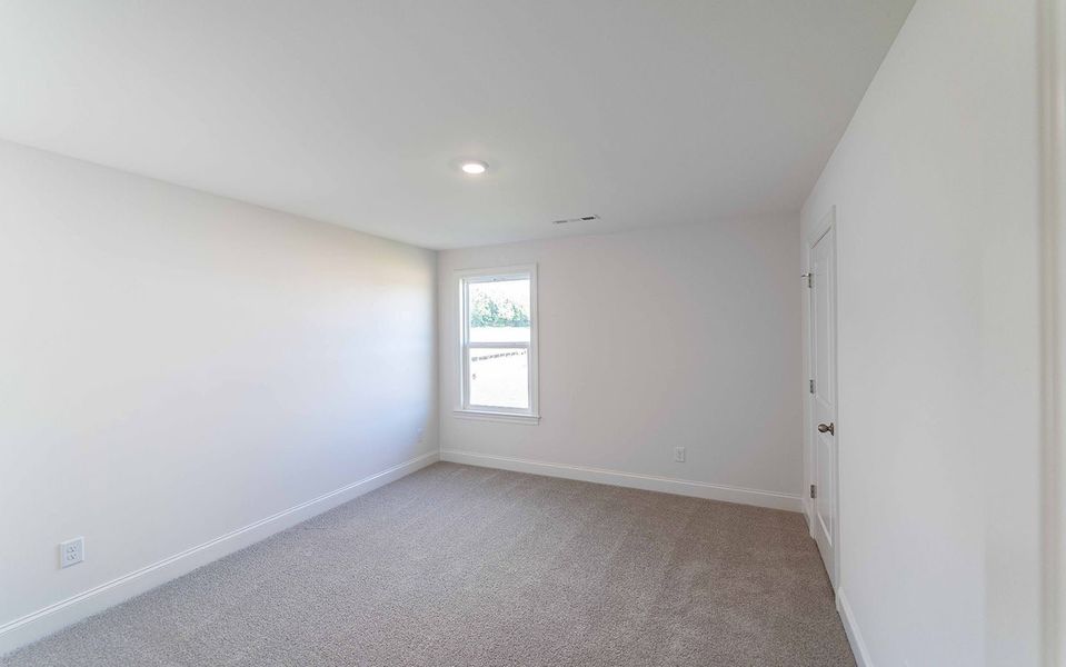 Spacious, unfurnished interior of a new home in Aden Woods, Fairview (Image 26).