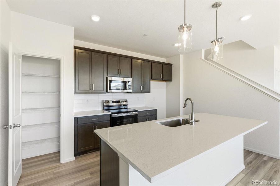 Furnished interior view inside a new home in Turnberry, Commerce City (Image 11).