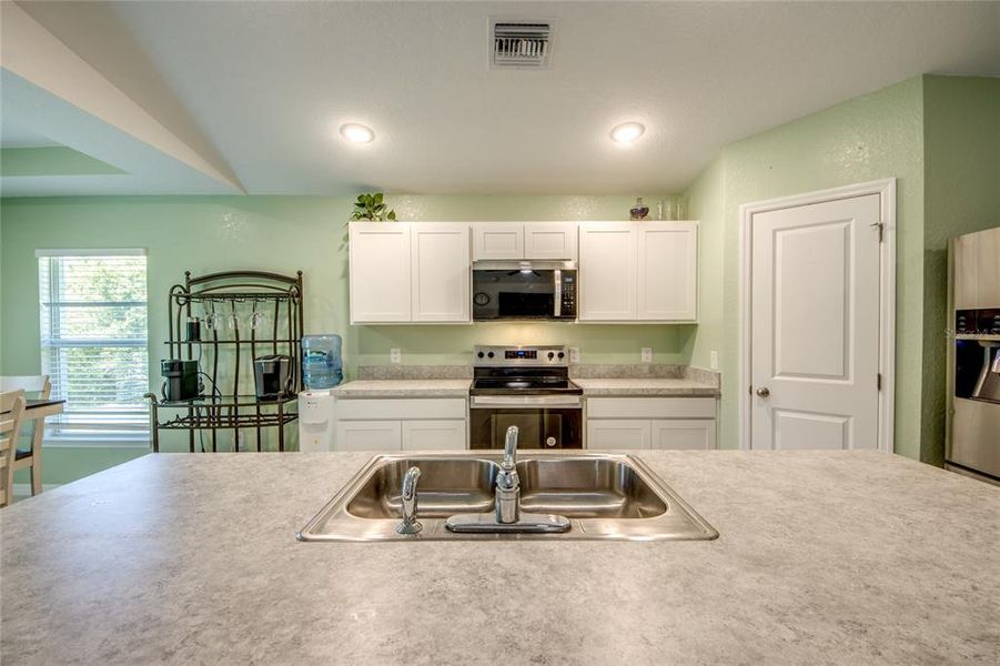 Furnished interior view inside a new home in , Port Charlotte (Image 12). Furnished interior view inside a new home in , Port Charlotte (Image 12).